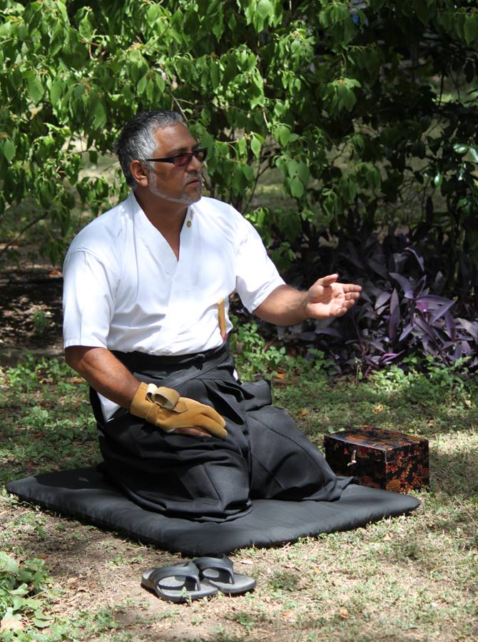 Toby Bernal explains kyudo at a demonstration at the Austin Zen Center's Spring Fair.